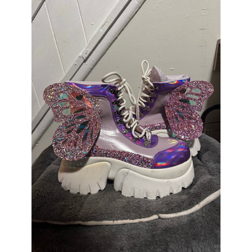 Koi Footwear WINGS OF A BUBBLEGUM EYED PIXIE BOOTS in Purple